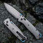 Damascus Folding Pocket Knife - Lightweight TC4 Handle, Drop Point Steel Blade, Dual Thumb Stud, Crossbar Lock, Deep Carry Clip